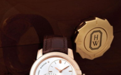 Harry Winston. A Pink Gold Wristwatch with Moonphases and Date with Eccentric Dial