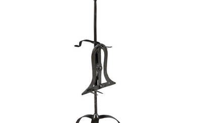 A 19TH CENTURY FORGED IRON HEARTH FREE STANDING LARK...