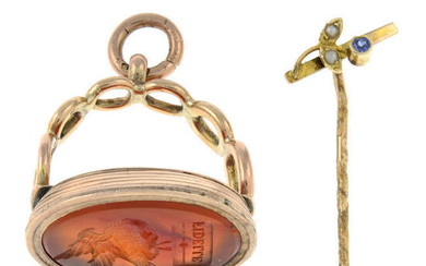 A 19th century gold carnelian fob seal and an early 20th century 9ct gold sapphire and split pearl stickpin.