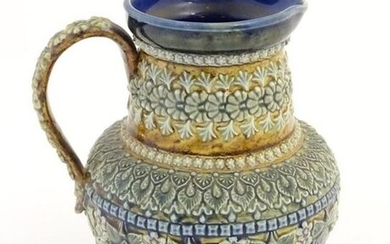 A 19thC Doulton Lambeth jug with a banded floral design
