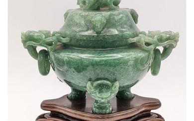 A 20th century Chinese jade censor, the lid decorated with a...