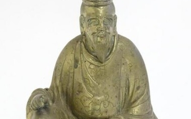 A 20thC Japanese cast model of a seated gentleman