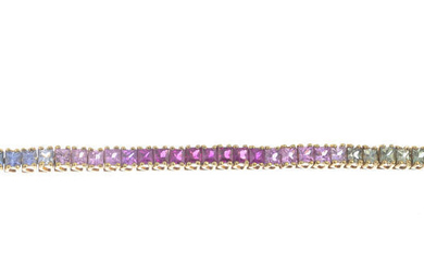 A 9ct gold vari-hue sapphire bracelet.