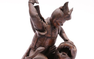A Bronze Figure of A Warrior and Beast (H 21cm some losses apparent)