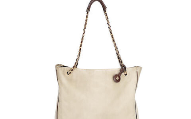 A CANVAS AND BROWN LEATHER SHOULDER TOTE Chanel, Late 1980s
