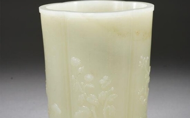 A CARVED WHITE SQUARED BRUSH POT