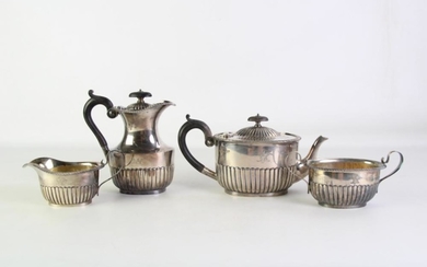 A Cased 4 piece Hallmarked Sterling Silver Tea Set with Dedication, London (combined weight incl. handles etc - approx 1.2kg)