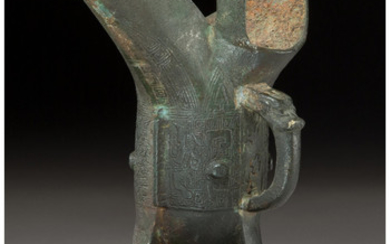 A Chinese Bronze Tripod Jue Wine Vessel (Shang Dynasty)