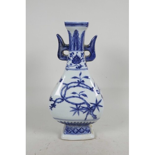 A Chinese blue and white porcelain sectional vase with two l...
