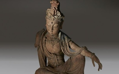 A Chinese carved and painted wood figure of Guanyin
