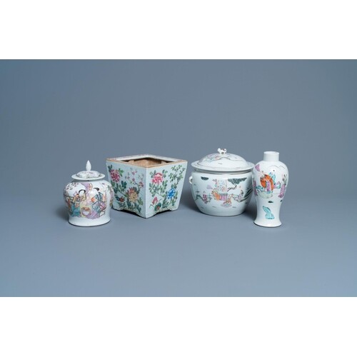 A Chinese famille rose jardiniere, two vases and a covered b...