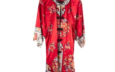 A Chinese hand-embroidered red silk robe, with floral decora...