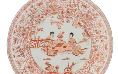 A Chinese iron-red plate, decorated with figures, Kangxi...