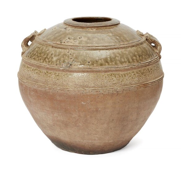 A Chinese 'proto-porcelain' ash-glazed jar, hu, Han dynasty, moulded to...