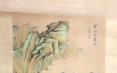 A Chinese silk mounted scroll depicting a landscape scene, L. 217cm.