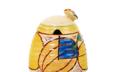 A Clarice Cliff Melon pattern beehive honey pot and matched ...