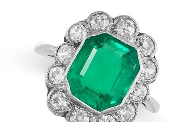 A FINE COLOMBIAN EMERALD AND DIAMOND CLUSTER RING in