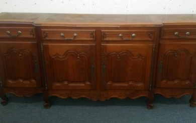 A FRENCH STYLE SIDEBOARD, with four frieze drawers over