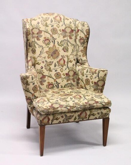 A GEORGIAN STYLE MAHOGANY WING ARM CHAIR with loose