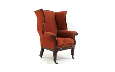 A George III mahogany library or reading chair