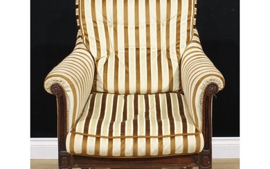 A George IV mahogany library chair, cane back, stuffed-over ...
