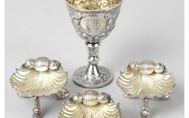 A George IV silver communion goblet, together with three late Victorian silver shell salts. (4).