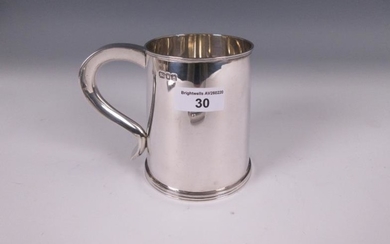 A George VI silver plain pint Mug, London 1943...
