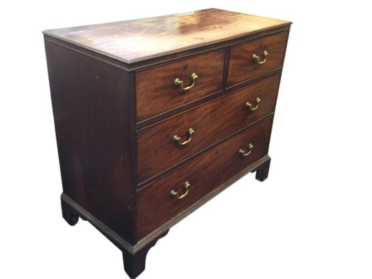 A Georgian mahogany chest of drawers, the rectangular moulded...