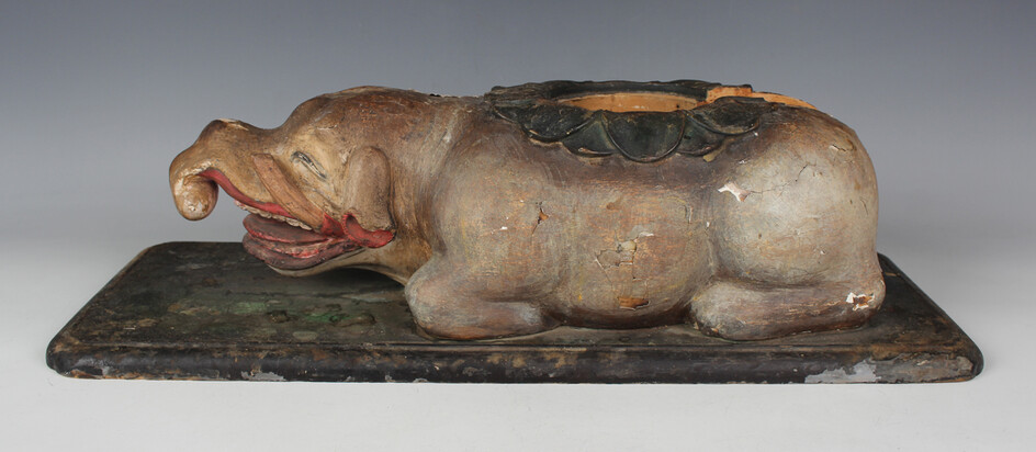 A Japanese lacquered and carved wood baku incense burner, 18th century, the elephant-like animal mod