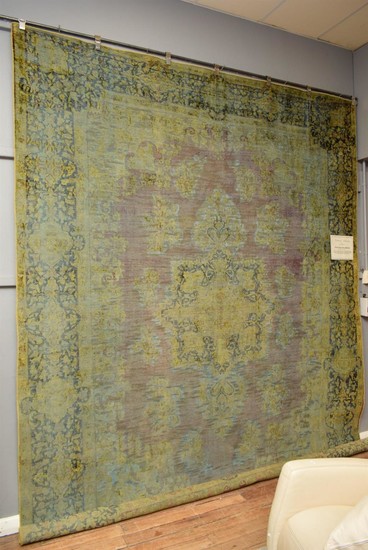 A LARGE AND UNIQUE MODERN VINTAGE OVER DYED AND HAND CARVED PERSIAN KERMAN CARPET CREATED FROM A HAND KNOTTED VINTAGE PERSIAN KERMAN...