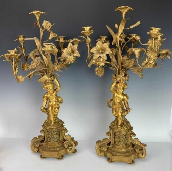 A LARGE PAIR OF DORE BRONZE FIGURAL CANDELABRA