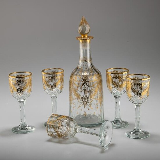 A LATE GEORGE III GILDED GLASS DECANTER AND FIVE GLASSES