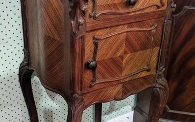 A LOUIS STYLE PARQUETERY BEDSIDE CABINET