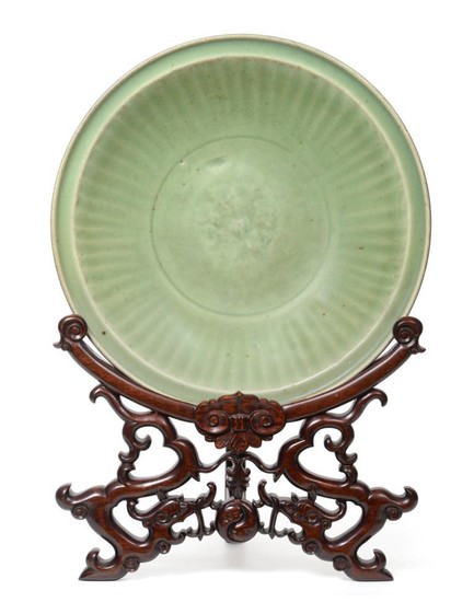 A Longquan Celadon Dish, Ming dynasty, carved with a central...