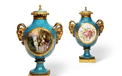 A PAIR OF FRENCH SÈVRES STYLE ORMOLU MOUNTED VASES AND COVERS