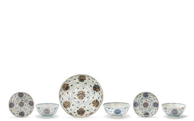 A PAIR OF 'LOTUS' BOWLS AND SAUCERS, A BLUE AND WHITE 'LOTUS' BOWL AND A 'LOTUS SCROLL' DISH