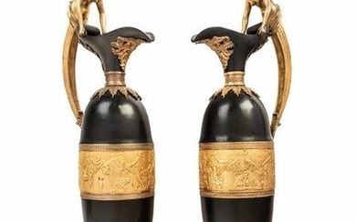A Pair of Continental Gilt and Patinated Bronze Ewers