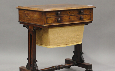A Regency rosewood work table, the hinged lid above a drawer and basket, on scroll supports and bun
