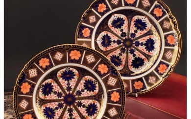 A Royal Crown Derby Imari pattern shaped circular plate, the...