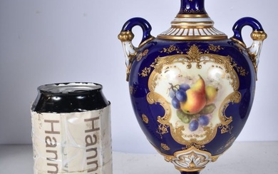 A Royal Worcester vase decorated with a central Cartouche of fruit signed Seabright 21 cm