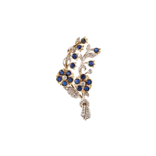 A SAPPHIRE AND DIAMOND FLORAL SPRAY BROOCH, mounted in white...