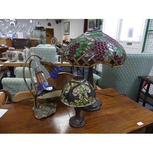A Tiffany-style table lamp, with stained glass shade, 24in (...