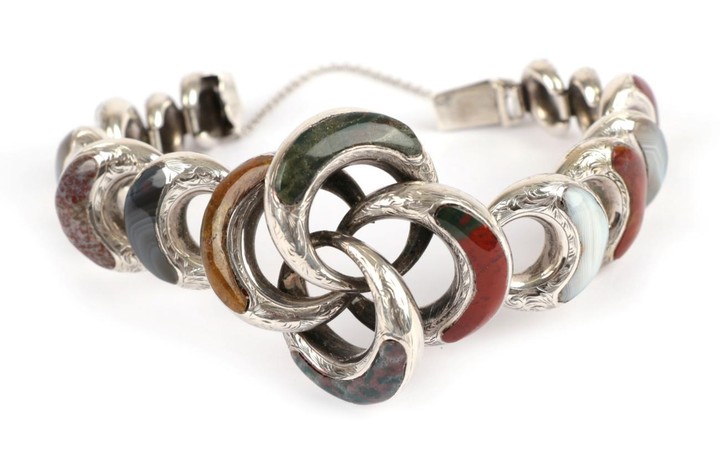 A Victorian Scottish Hardstone Bracelet, graduated engraved loop links with...