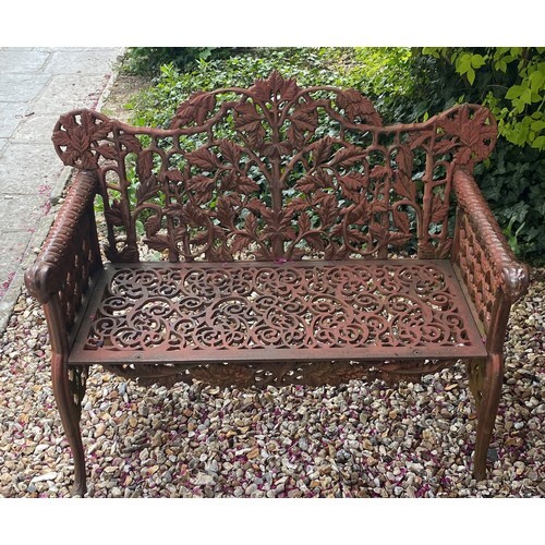 A Victorian style cast metal garden bench, 110 cm wide