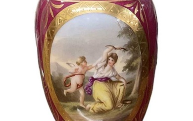 A Vienna porcelain red ground hand painted urn decorated with...