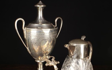 A Vintage Cut Glass Lemonade Jug with silver plated mounts and a ice cylinder to the interior, 11''
