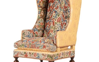 A WALNUT AND NEEDLEWORK UPHOLSTERED WING ARMCHAIR, 17TH CENTURY AND LATER ELEMENTS