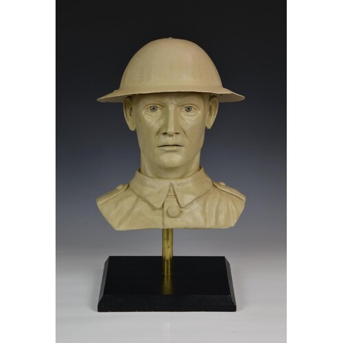 A bespoke plaster bust of a British Army soldier, wearing an...