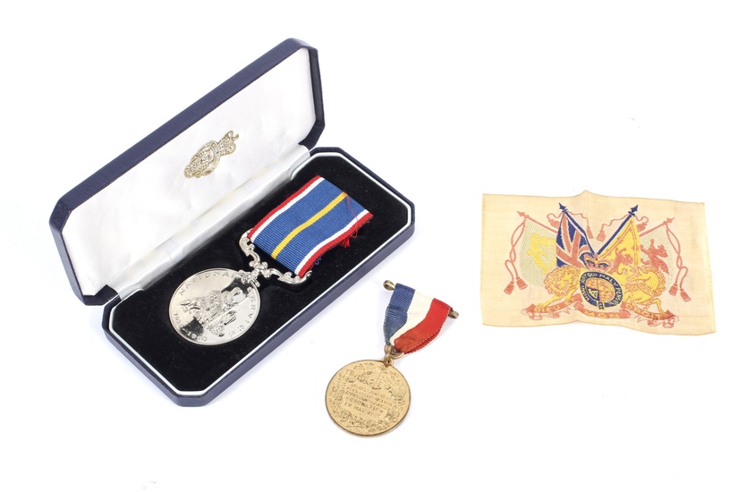 A boxed National Service Medal and an Edward VIII Coronation Medal