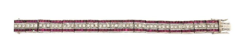 A diamond and ruby flexible bracelet, designed as series of articulated diamond three stone and calibre ruby rectangular panels, stamped 750, approx. length 17.5cm